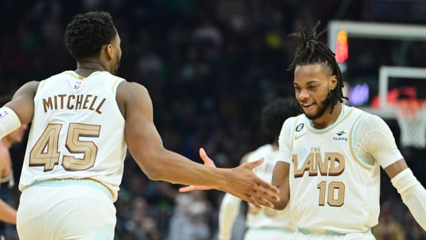 Mar 17, 2023; Cleveland, Ohio, USA; Cleveland Cavaliers guard Donovan Mitchell (45) and Cleveland Cavaliers guard Darius Garland (10) celebrate during the first half against the Washington Wizards at Rocket Mortgage FieldHouse. Mandatory Credit: Ken Blaze-USA TODAY Sports